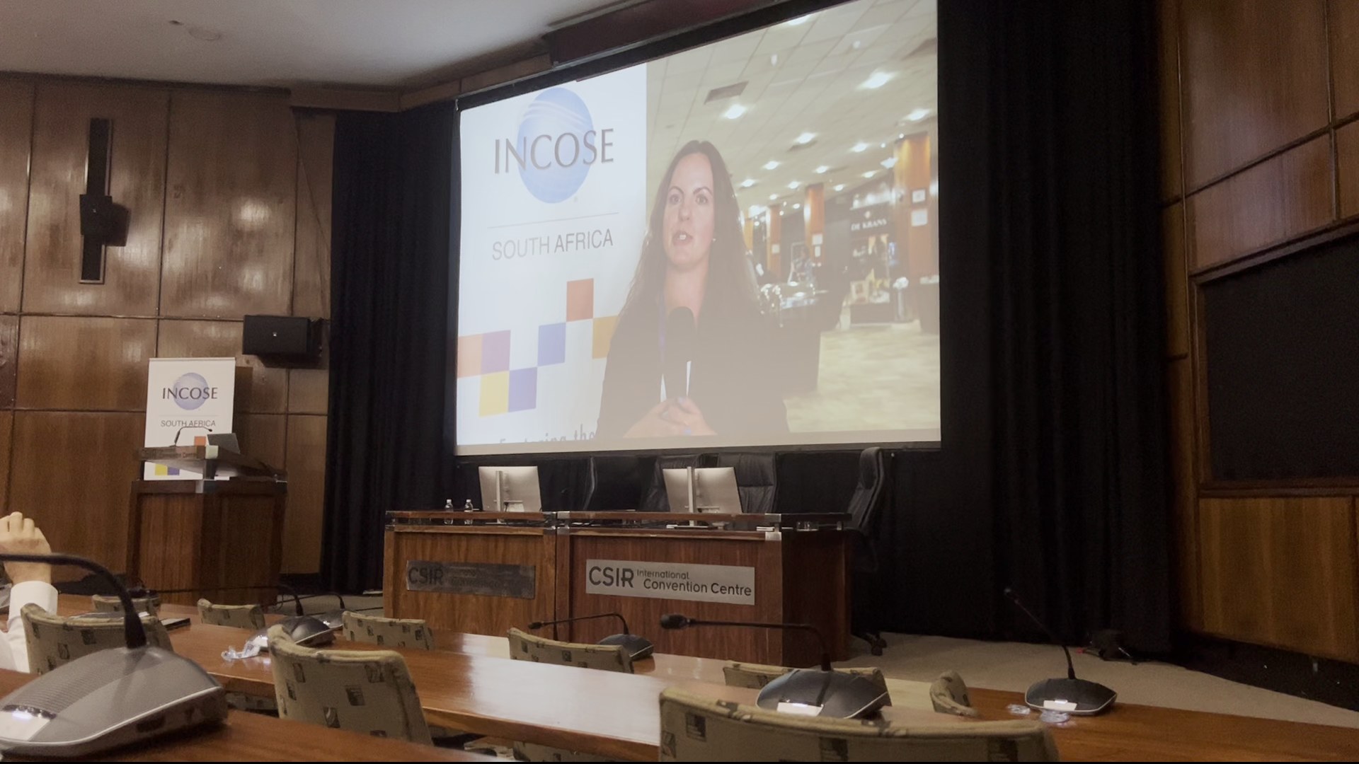 Still frame from the INCOSE 2024 keynote room and presentation screen